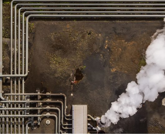 Aerial view of overhead pipelines at the Hellisheidi geothermal power plant, Iceland.